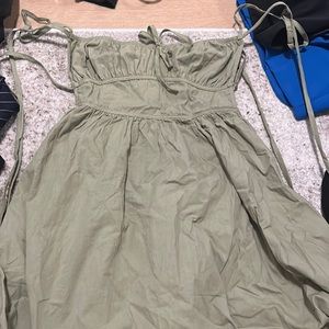 Green open back strappy tie dress